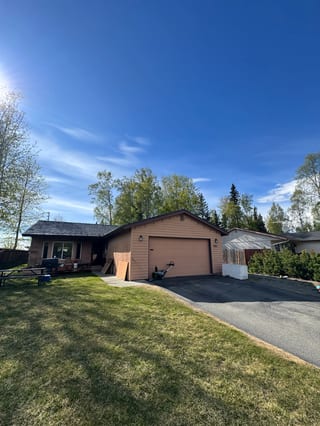 Black Interlock Shake aluminum roof on the home, Anchorage, Alaska