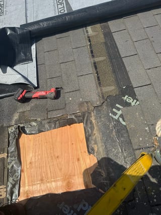 A metal roof being installed with underlayment visible