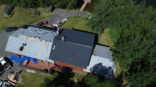 Interlock Aluminum Shake Metal Roofing – Deep Charcoal | Palmer, AK (Aerial)
