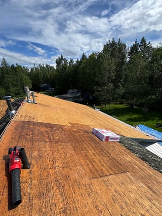 Interlock Aluminum Slate Metal Roofing – Musket Grey | Palmer, AK (During installation)