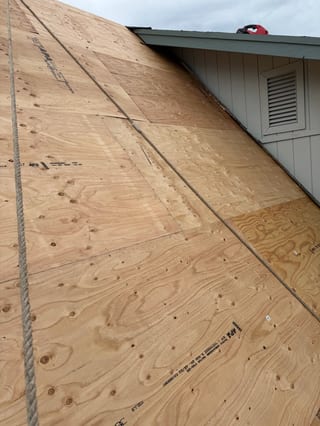 Interlock Aluminum Slate Metal Roofing – Musket Grey | Palmer, AK (During installation)