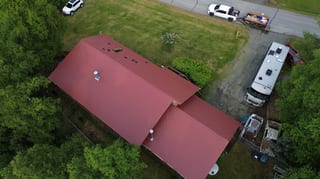 Interlock Aluminum Cedar Shingle Metal Roofing – Tile Red | Chugiak, AK (Aerial)