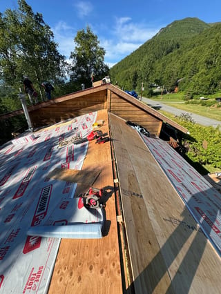Interlock Aluminum Cedar Shingle Metal Roofing – Tile Red | Chugiak, AK (Full roof overview)