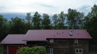 Interlock Aluminum Cedar Shingle Metal Roofing – Tile Red | Chugiak, AK (Full roof overview)