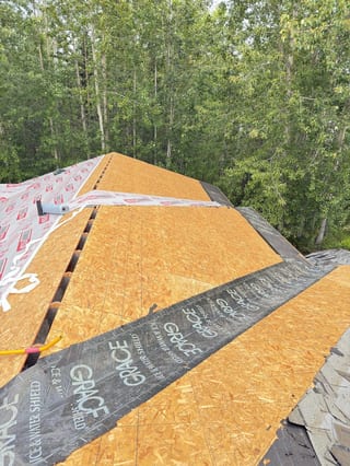 Interlock Aluminum Slate Metal Roofing – Black | Wasilla, AK (During installation)