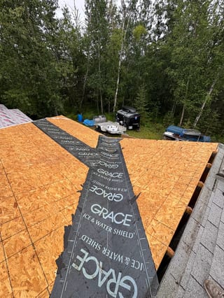Interlock Aluminum Slate Metal Roofing – Black | Wasilla, AK (During installation)