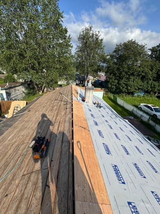 Interlock Aluminum Cedar Shingle Metal Roofing – Tile Red | Anchorage, AK (During installation)