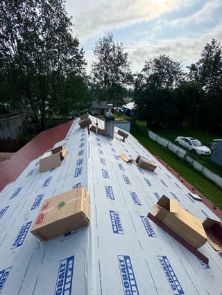 Interlock Aluminum Cedar Shingle Metal Roofing – Tile Red | Anchorage, AK (During installation)