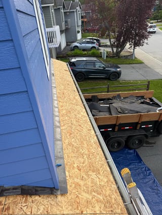 Interlock Aluminum Slate Metal Roofing – Deep Charcoal | Eagle River, AK (After)