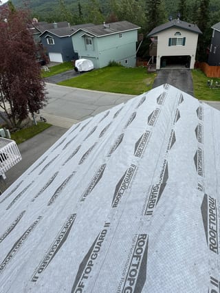 Interlock Aluminum Slate Metal Roofing – Deep Charcoal | Eagle River, AK (Full roof overview)