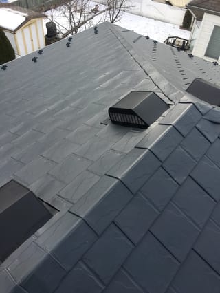 Deep Charcoal Interlock Slate aluminum roof on a single-storey home with Interlock Slate roof in Deep, Fort Saskatchewan, Alberta