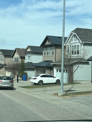 Deep Charcoal Interlock Slate aluminum roof on a modern home with a metal roof in a suburban urban setting, Calgary, Alberta