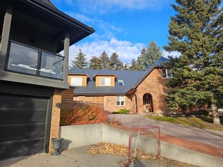 Interlock Aluminum Slate Metal Roofing – Deep Charcoal | Calgary, AB (Front-left elevation)