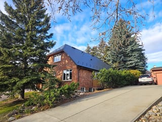 Interlock Aluminum Slate Metal Roofing – Deep Charcoal | Calgary, AB (Front-right elevation)
