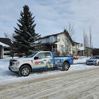 Interlock Aluminum Cedar Shingle Metal Roofing – Deep Charcoal | Crossfield, AB (Street view)