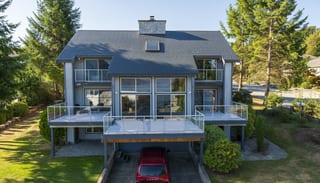Deep Charcoal Interlock Slate aluminum roof on a large Deep Charcoal Interlock Slate metal roof on a, Sechelt, British Columbia