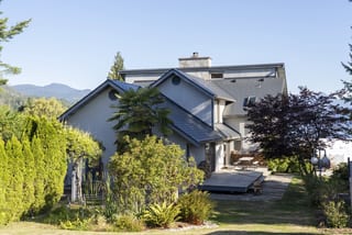 Interlock Aluminum Slate Metal Roofing – Deep Charcoal | Sechelt, BC (Rear elevation)
