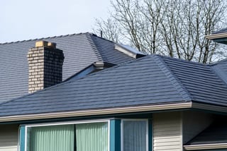 Deep Charcoal Interlock Slate aluminum roof on a modern home with a metal roof in Surrey, BC, Surrey, British Columbia