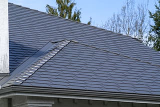 Musket Grey Interlock Slate aluminum roof on a modern home with a metal roof in Surrey, BC, Surrey, British Columbia