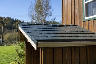 Hunter Green Interlock Slate aluminum roof on a brown ranch style home with a metal roof in a rural area, Langley, British Columbia