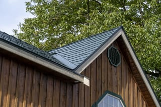 Hunter Green Interlock Slate aluminum roof on a brown single-storey chalet with a Hunter Green metal roof, Langley, British Columbia