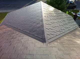 Colonial Brown Interlock Slate aluminum roof on a colonial home with a metal roof in a coastal urban setting, Campbell River, British Columbia