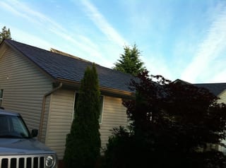 Colonial Brown Interlock Slate aluminum roof on a Colonial home with a Colonial Brown metal roof in, Campbell River, British Columbia
