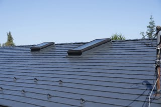 Deep Charcoal Interlock Slate aluminum roof on a deep charcoal roof on a house in Ladysmith, BC, Ladysmith, British Columbia