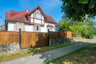 Before: a worn out asphalt shingle roof on the home, Victoria, British Columbia, ahead of a Tile Red Interlock Slate aluminum roof