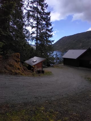 Deep Charcoal Interlock Slate aluminum roof on a Deep Charcoal Interlock Slate roof on a home in a, Juan de Fuca, British Columbia