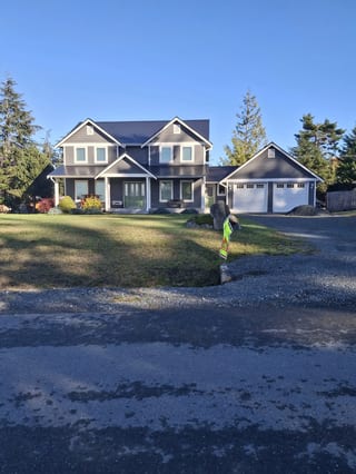 Black Interlock Slate aluminum roof on a modern house with a slate black metal roof in Sooke BC, Sooke, British Columbia