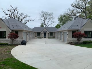 Musket Grey Interlock Slate aluminum roof on a cream coloured ranch style home with a grey metal roof, Long Grove, Illinois
