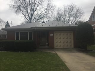 Colonial Brown Interlock Slate aluminum roof on a Colonial brown metal roof on a single-family home in, Des Plaines, Illinois