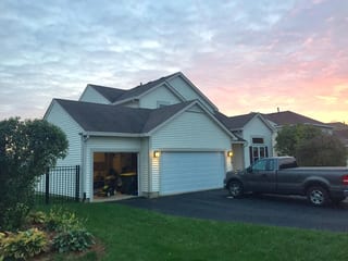 Before: a worn out asphalt shingle roof on the home, Carol Stream, Illinois, ahead of a Colonial Brown Interlock Slate aluminum roof