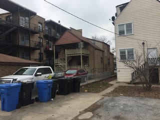 Before: a leaking asphalt shingle roof on the home, Chicago, Illinois, ahead of a Colonial Brown Interlock Slate aluminum roof