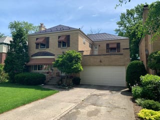 Colonial Brown Interlock Slate aluminum roof on a two-storey brick Colonial home with a Colonial Brown, River Forest, Illinois