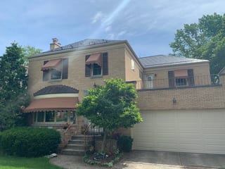 Colonial Brown Interlock Slate aluminum roof on a tan two-storey home with Colonial style and a Colonial, River Forest, Illinois