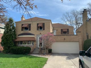 Before: a leaking asphalt shingle roof on the home, River Forest, Illinois, ahead of a Colonial Brown Interlock Slate aluminum roof