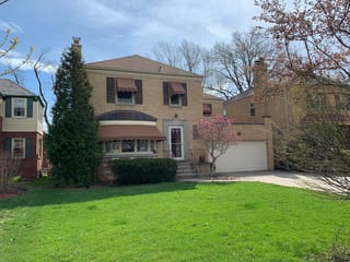 Before: a leaking asphalt shingle roof on the home, River Forest, Illinois, ahead of a Colonial Brown Interlock Slate aluminum roof