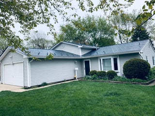 Deep Charcoal Interlock Slate aluminum roof on a house with Deep Charcoal metal roof in a suburban, Elgin, Illinois