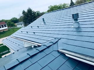 Deep Charcoal Interlock Slate aluminum roof on a single-family home with Interlock Slate aluminum roof in, Elgin, Illinois