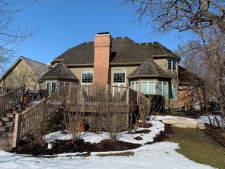 Before: a worn out wood shake roof on the home, Crystal Lake, Illinois, ahead of a Deep Charcoal Interlock Slate aluminum roof