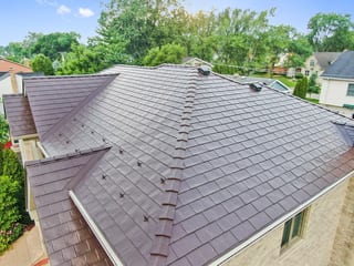 Colonial Brown Interlock Slate aluminum roof on a colonial home with a colonial brown metal roof in a, Calredon Hills, Illinois