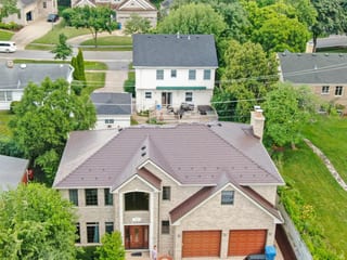 Colonial Brown Interlock Slate aluminum roof on a colonial home with a brown metal roof in a suburban area, Calredon Hills, Illinois