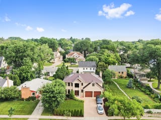 Colonial Brown Interlock Slate aluminum roof on a Colonial home with a metal roof in a suburban, Calredon Hills, Illinois