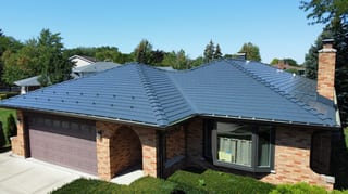 Deep Charcoal Interlock Slate aluminum roof on a brick ranch home with a slate blue roof in a suburban, Westmont, Illinois