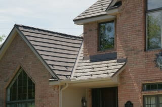 Weathered Interlock Shake aluminum roof on a brick home with a metal roof in a suburban setting, Mendota Heights, Minnesota