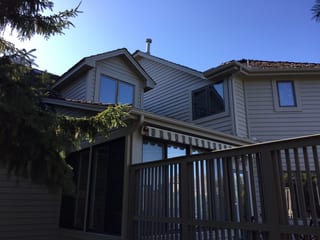 Before: a worn out wood shake roof on the home, Mendota Heights, Minnesota, ahead of a Weathered Interlock Shake aluminum roof