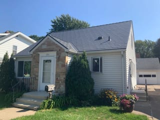 Musket Grey Interlock Slate aluminum roof on a cream-coloured ranch home with a grey metal roof and a, St. Paul, Minnesota