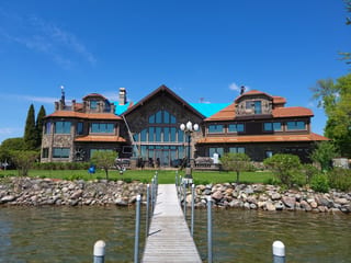 Copper Penny Interlock Shake aluminum roof on a modern home with copper penny metal roof on waterfront, Mound, Minnesota